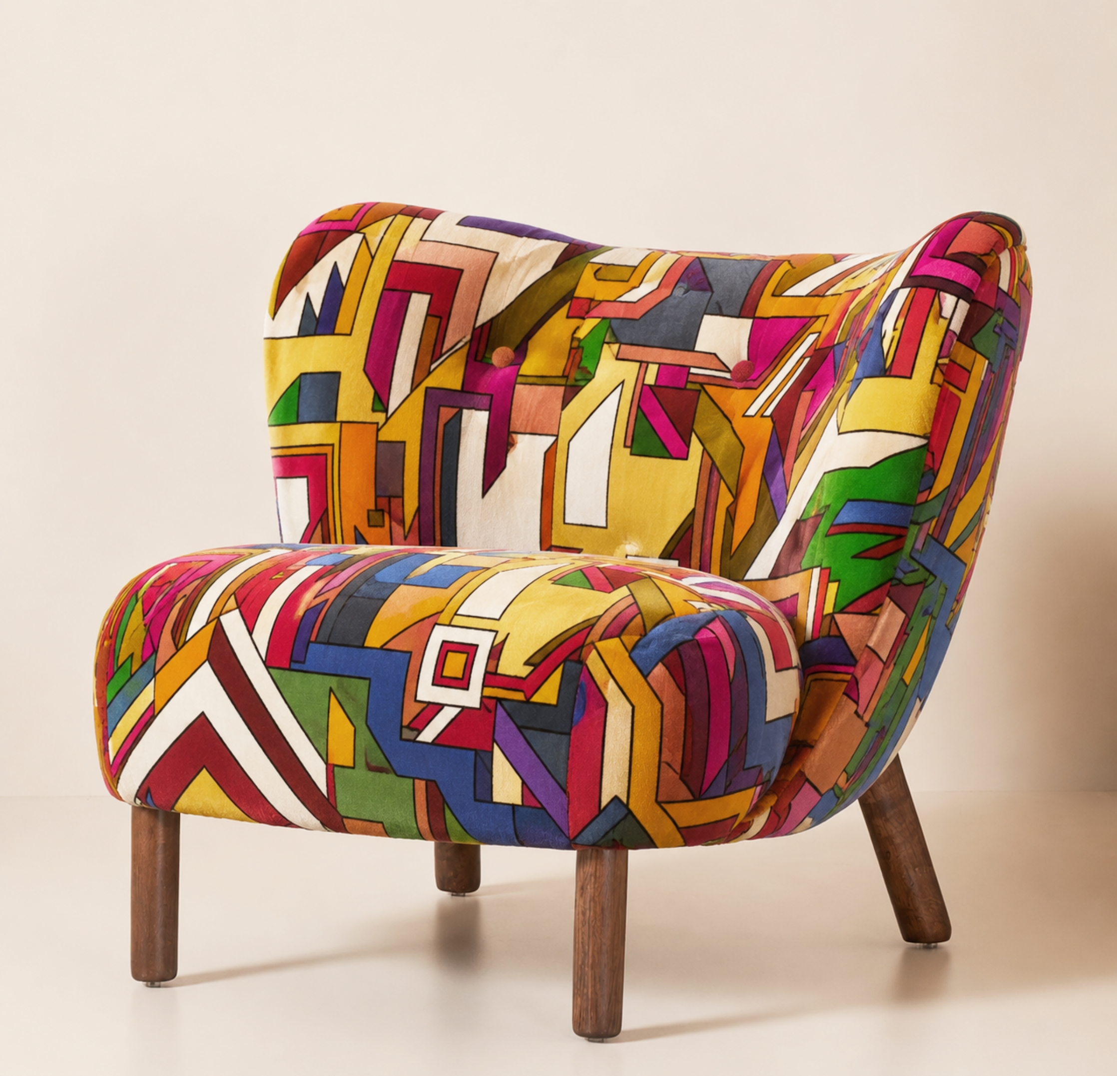 a miid century modern chair upholstered in a colourful velvet bauhaus fabric.