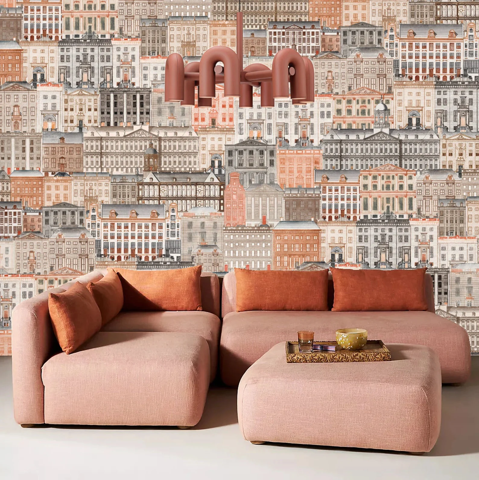 architectural wallpaper behind a modern sofa